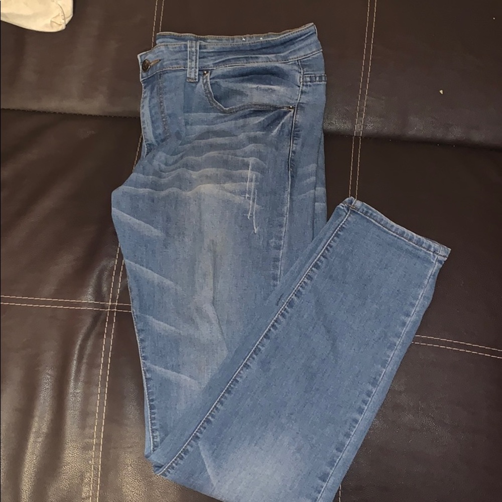 Blue slightly ripped skinny jeans